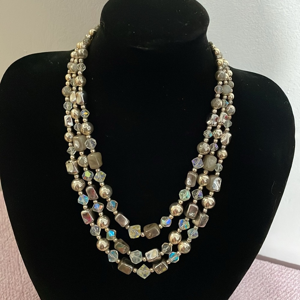Vintage 3 strand beaded necklace with Japan stamped on it.